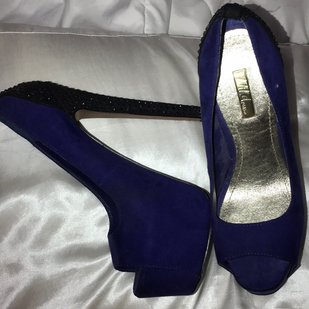 Blue heels with black tiny spikes on heel
